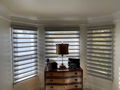 Bedroom nook with hanging blinds